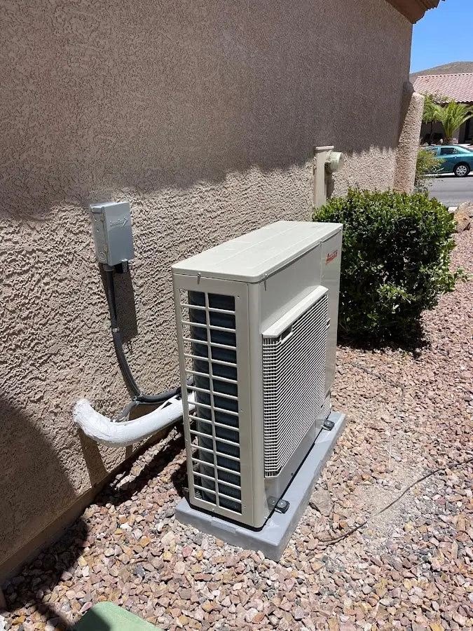 Residential air conditioning condenser unit in North Castle